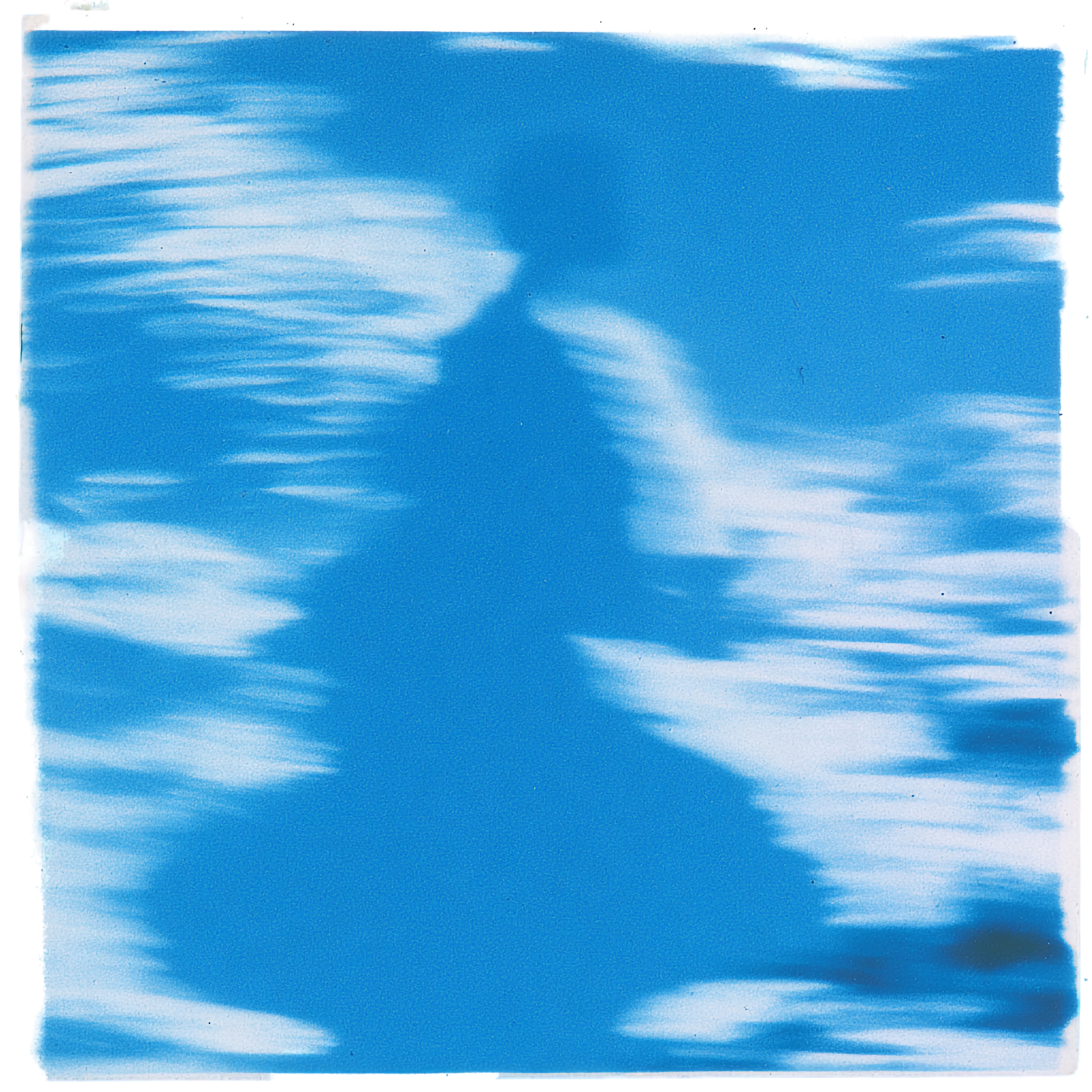 Square blue photographic image with a dark central shadow, luminous streaks, and a white border.